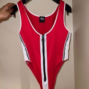LF high cut bodysuit, zipper detail! Size L, worn once!